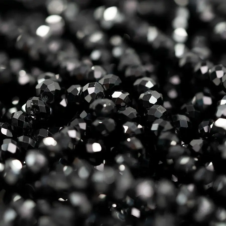 Black faceted spinel - string