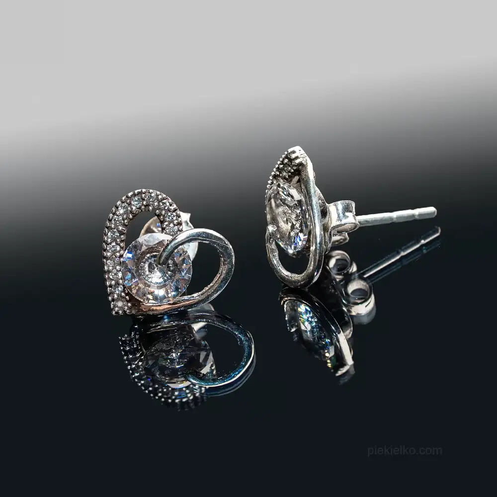 Silver earrings with heart-shaped zircon